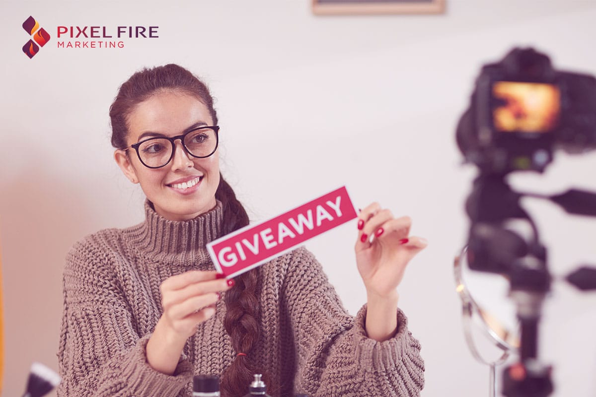 Woman holding giveaway sign with the purpose of creating followers